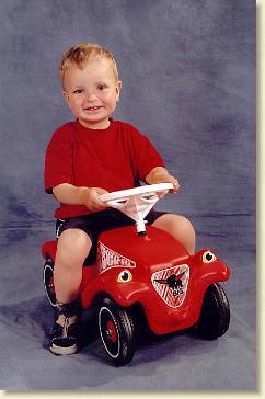 20060619-01 Op de auto van de schoolfotograaf